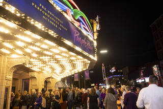 Theatergoers at the State Theater in Minneapolis, just a block from First Avenue, the music club Prince once owned and where the ?Purple Rain? movie was mostly filmed, Oct. 16, 2025. (Jenn Ackerman/The New York Times)